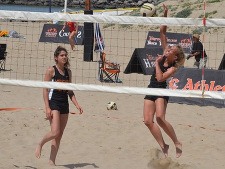 Shea Mckeown goes for the hit while Taylor Benitez-Fanslow readies for the return at a recent match. The Pirates' beach volleyball duo won a pair of matches Friday in VC's regular season finale.