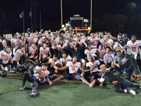 The Pirate football team celebrates their 62-7 win over rival Moorpark in the 51st Citrus Cup game at the Sportsplex on Saturday.