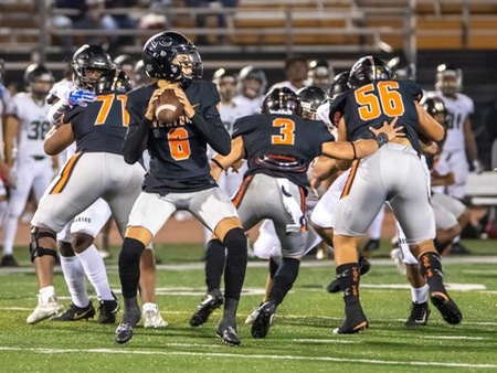 VC quarterback Dino Maldonado (6) readies to pass the ball downfield behind the protection of DJ Peterson (71), Jayden Vargas (3) and Edward Laie (56). The Pirates held off the Huskies late charge for a 45-42 victory. (photo by Felix Cortez)