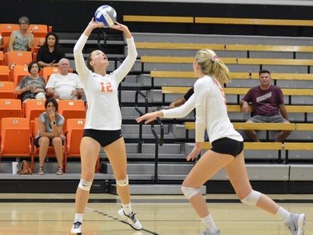 Freshman setter Kassidy Wilson (12) handed out 37 assists Friday at the Pirate volleyball team swept a pair of matches at the Pasadena Quad. Freshman Tatum Teel (5) had nine kills on the day.