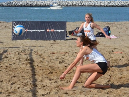 Brooklyn Wallet (near) sets up for the dig while Faith Mackie (4) readies for the kill in the Pirates' match against Pasadena City College's club team Friday at the Harbor Cove Courts at the Ventura Marina.