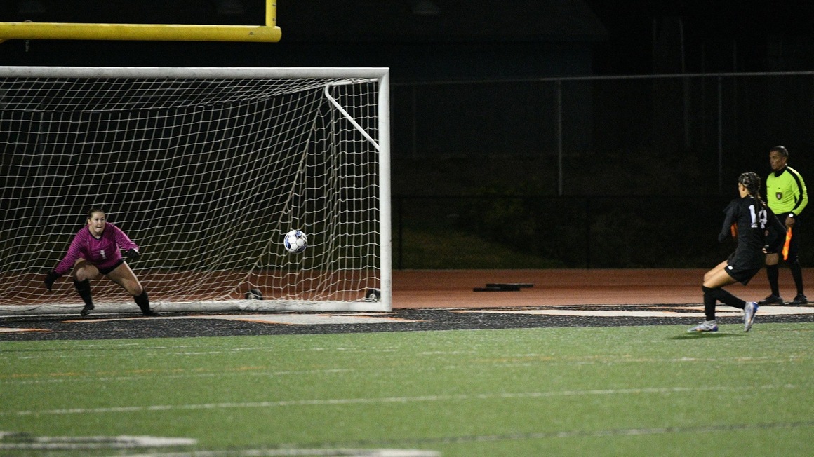 VC freshman Desire Lopez (14) send her final shot past the Moorpark goalie and into the net, sending the Pirates to the next round of the post-season as Ventura defeated Moorpark 5-4 in penalties following a 0-0 draw in the SoCal Regional Playoffs.