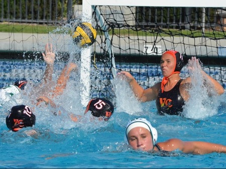 VC goalie Shayle Barrus makes a stop while Drew Reyes (10) and Raylinn Lipsky (15) play defense during the Pirates' WSC contest with Cuesta Saturday at the Ventura Aquatic Center. The Pirates split a pair of conference matches on the day.